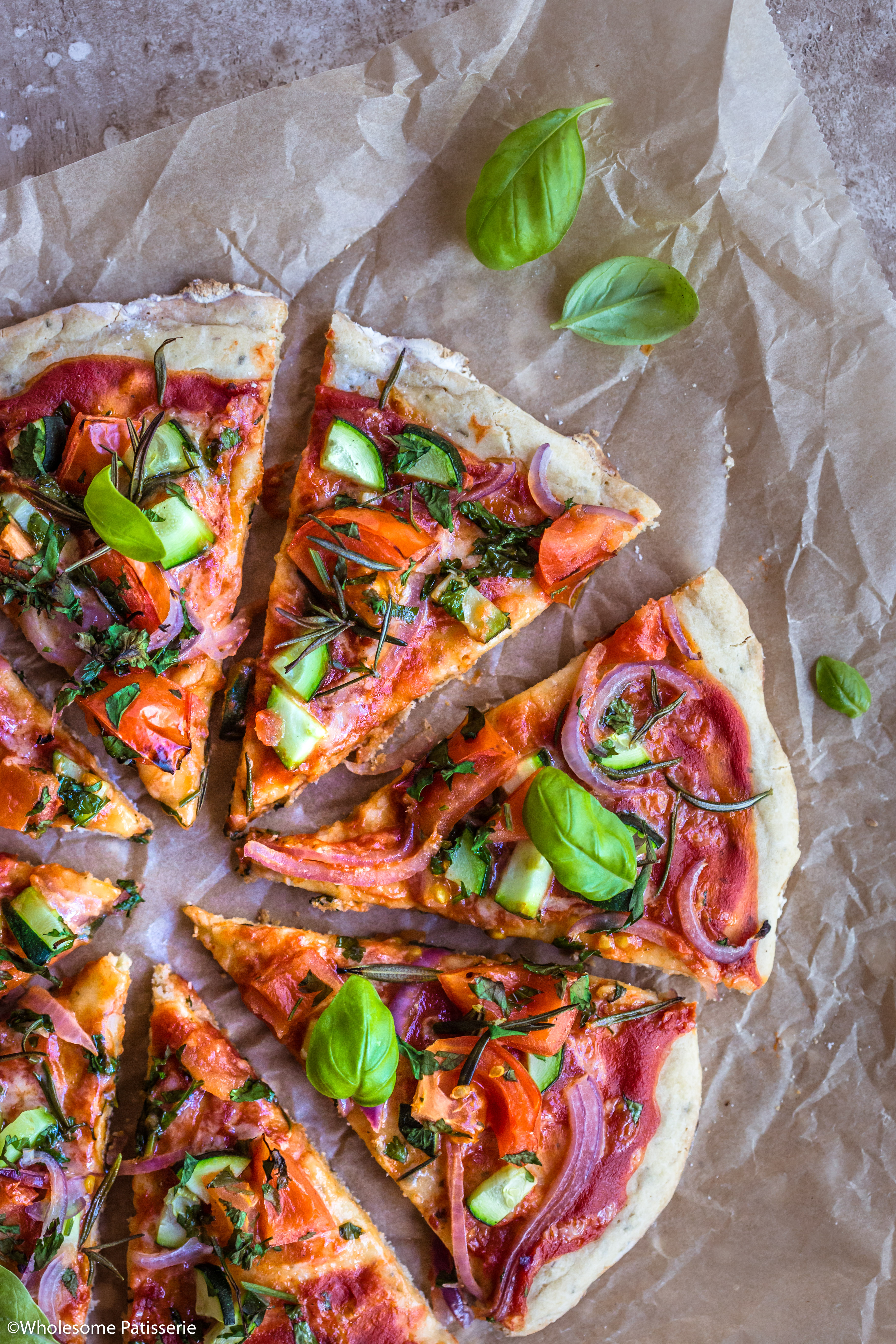 Gluten Free Pizza! Simple homemade pizza base topped with fresh, bursting with flavour veggies + herbs! #glutenfreepizza #glutenfree #pizza #vegetarianpizza