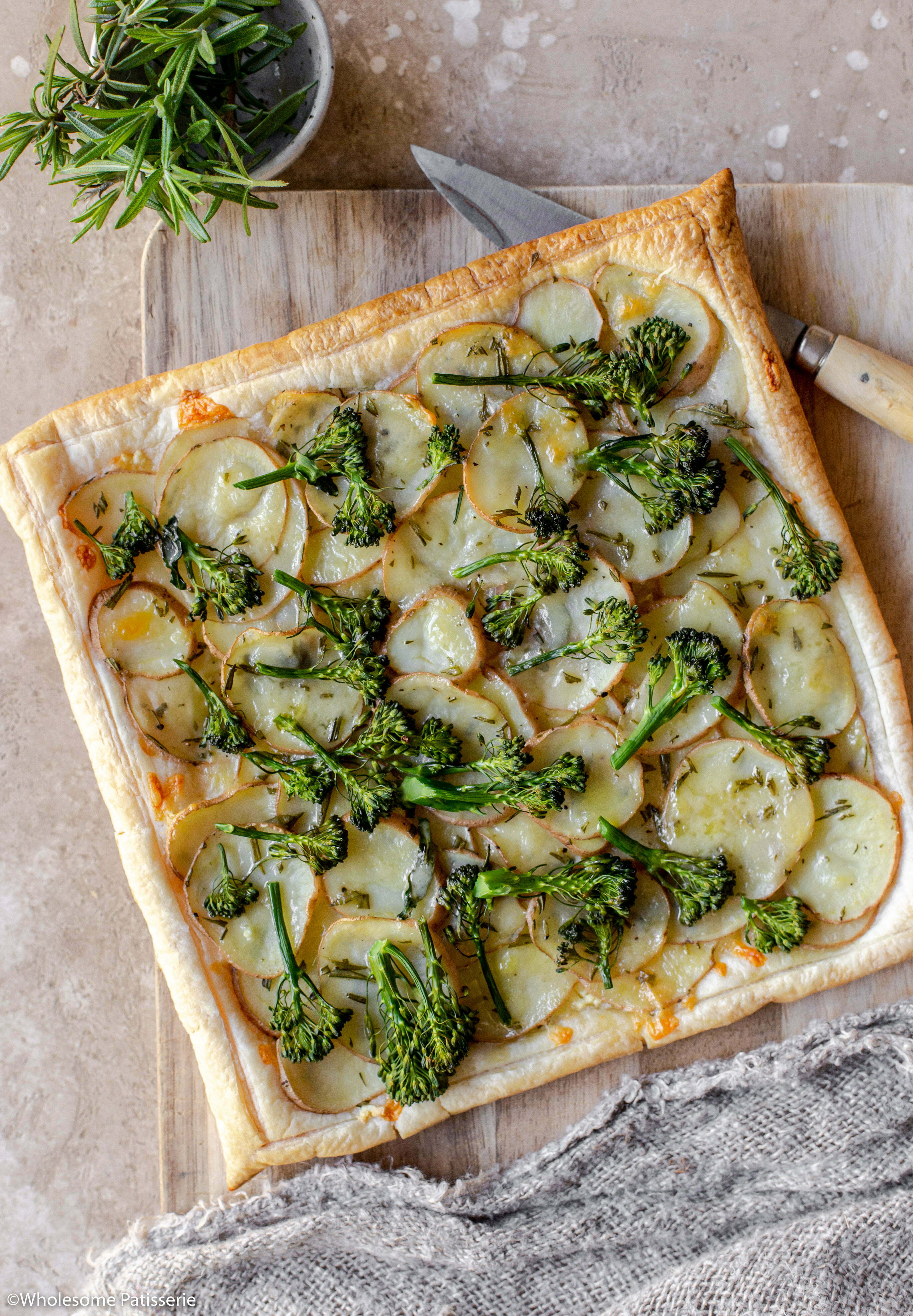 Crispy golden pastry tart filled with rosemary potatoes, extra sharp cheese, garlic and beautiful green broccolini!