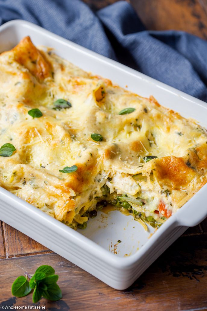 White Sauce Vegetable Lasagne! A creamy, golden and satisfying homemade lasagne. Created without meat or tomatoes like a traditional lasagne. Loaded with vegetables such as carrots, zucchini, mushrooms and more. Layered with a beautiful smooth white sauce infused with cheese, garlic and parsley. 