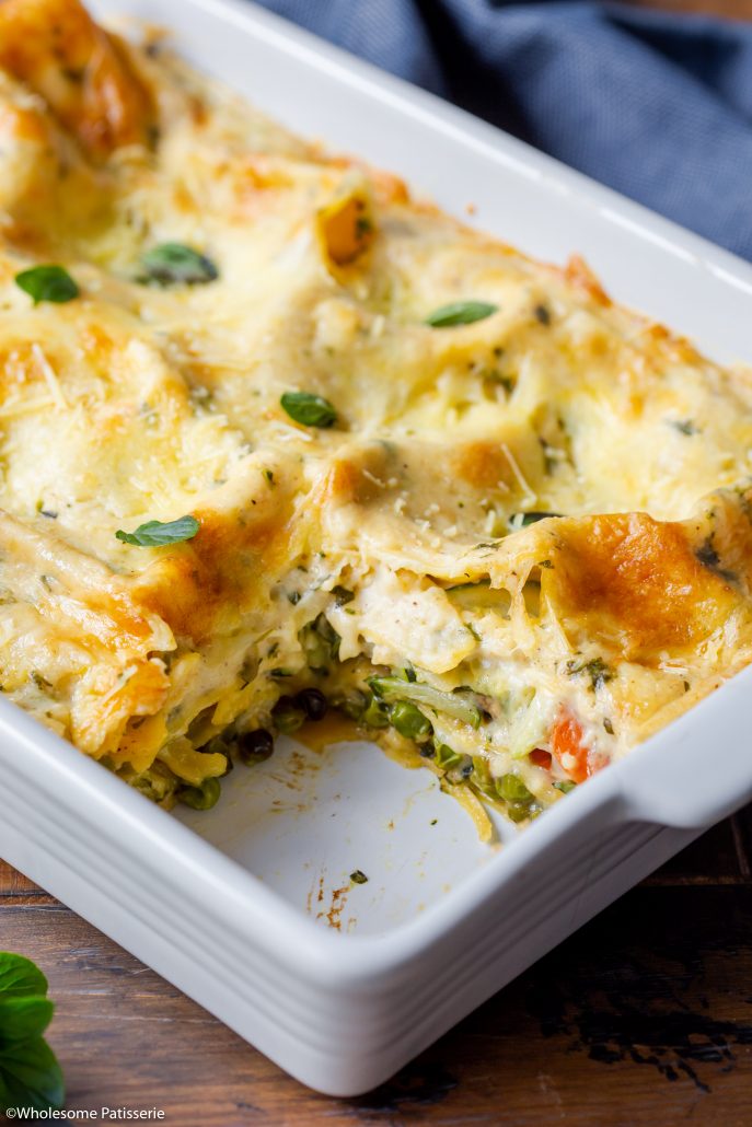White Sauce Vegetable Lasagne! A creamy, golden and satisfying homemade lasagne. Created without meat or tomatoes like a traditional lasagne. Loaded with vegetables such as carrots, zucchini, mushrooms and more. Layered with a beautiful smooth white sauce infused with cheese, garlic and parsley. 
