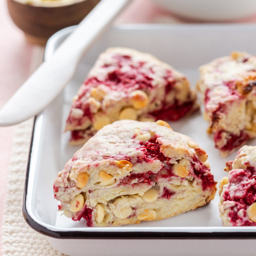 Raspberry & White Chocolate Scones! Can be made dairy and gluten free! Tart raspberries paired with creamy white chocolate is completely irresistible!