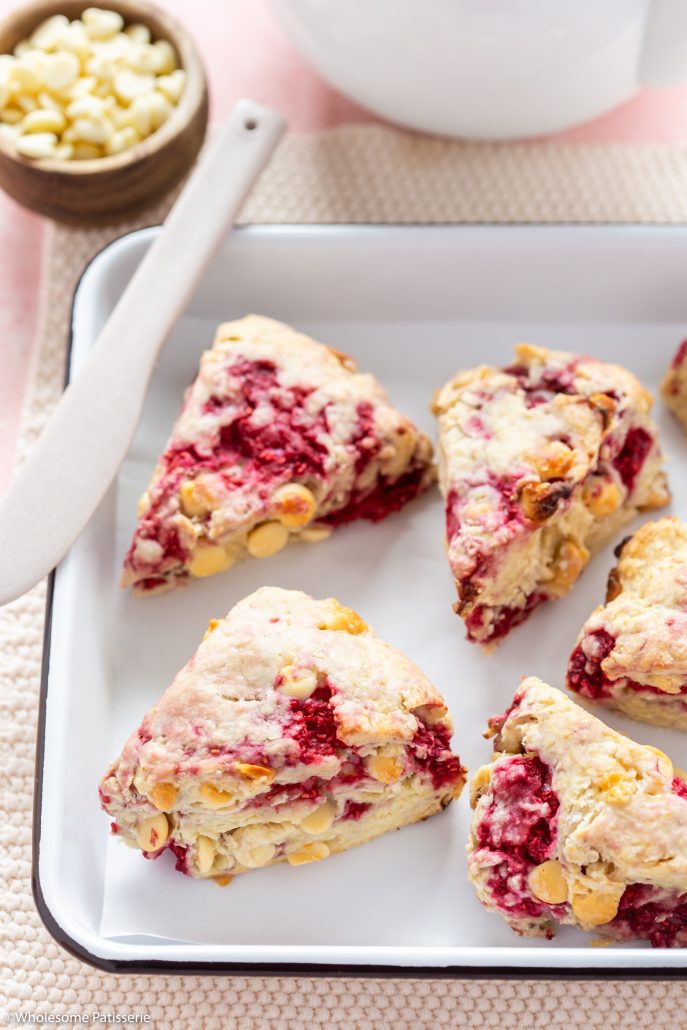 Raspberry & White Chocolate Scones! Can be made dairy and gluten free! Tart raspberries paired with creamy white chocolate is completely irresistible! 