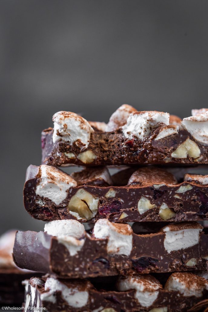 Chai Spiced Rocky Road Bark! Traditional chai spices blended through dark chocolate and combined with coconut, hazelnuts and dried cranberries. Sprinkled with mini marshmallows and a dusting of cocoa powder, yay! 