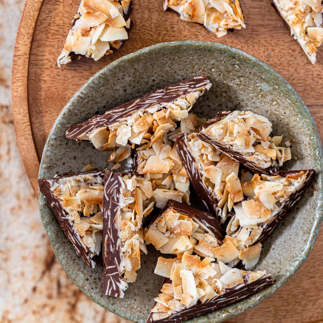 Dark Chocolate & Coconut Salted Clusters! These divine 5-ingredient clusters are utterly delicious! A melt-in-your-mouth dark chocolate base topped with toasted coconut flakes mixed with coconut oil and a little dark sugar. Finished off with a sprinkling of sea salt flakes - YUMM!!!