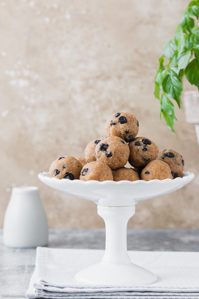 Blueberry Muffin Bliss Balls! A satisfying snack packed full of healthy fats, spiced with a touch of ground cinnamon and cardamom brings these more into baked muffin territory. Add dried blueberries and you have yourself one tasty treat!