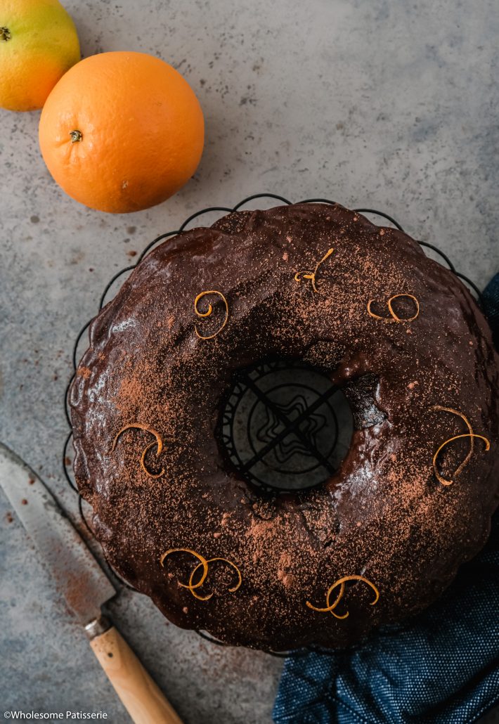 Chocolate Orange Bundt Cake! Taking two absolute classic flavours and pairing them together in a wholesome homemade bundt cake! This easy chocolate cake is infused with fresh orange zest and a hint of coffee to bring out even more of that beautiful cocoa flavour.