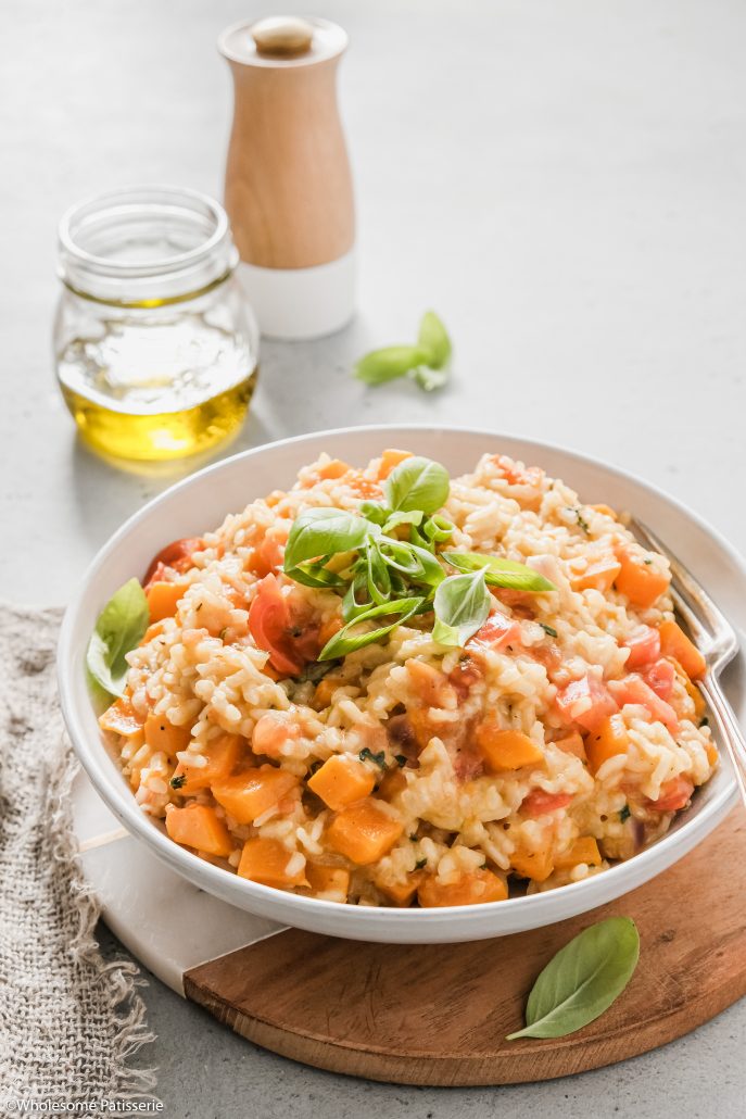 Pumpkin & Cherry Tomato Risotto! Creamy vegetarian risotto, homemade and glorious! Filled with pumpkin, bursting cherry tomatoes, spring onion and fresh basil! 