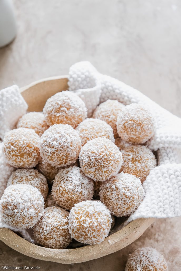 Citrus Bliss Balls! Simple homemade bliss balls infused with fresh zest and juice from lemon and orange. Sweetened with s touch of maple syrup and vanilla.