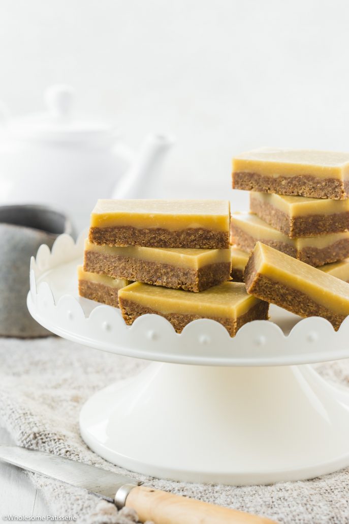 No Bake Ginger Slice! This glorious slice has a ginger nut biscuit base and a creamy golden icing with an extra touch of ground ginger. It has the perfect ratio of sweetness paired with the warm and sharp taste of ginger. Easy 3-ingredient base that requires no baking paired with a delicious icing that is velvety smooth. 
