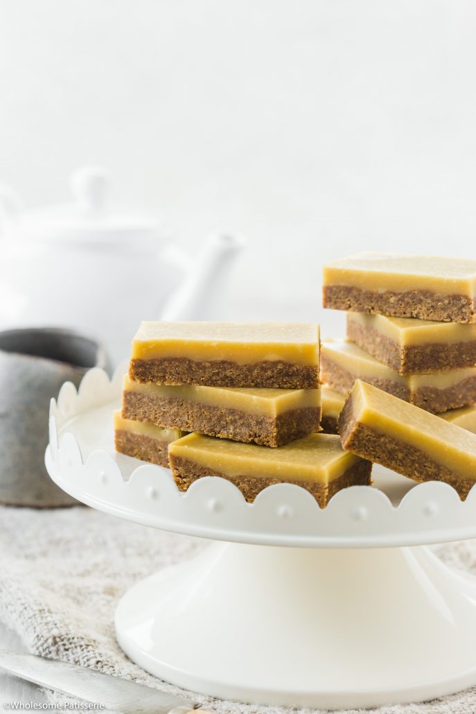 No Bake Ginger Slice! This glorious slice has a ginger nut biscuit base and a creamy golden icing with an extra touch of ground ginger. It has the perfect ratio of sweetness paired with the warm and sharp taste of ginger. Easy 3-ingredient base that requires no baking paired with a delicious icing that is velvety smooth. 
