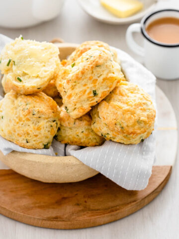 Cheese and chive scones in serving bowl