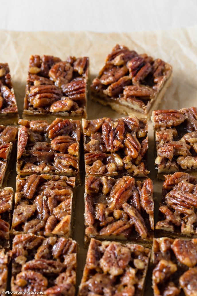 A scrumptious batch of Pecan Pie Bars will satisfy everyones sweet tooth. Created with an easy 4-ingredient shortbread base and an indulgent brown sugar and maple caramel pecan topping. These bars are a take on the traditional pecan pie, a classic and popular American dessert. 