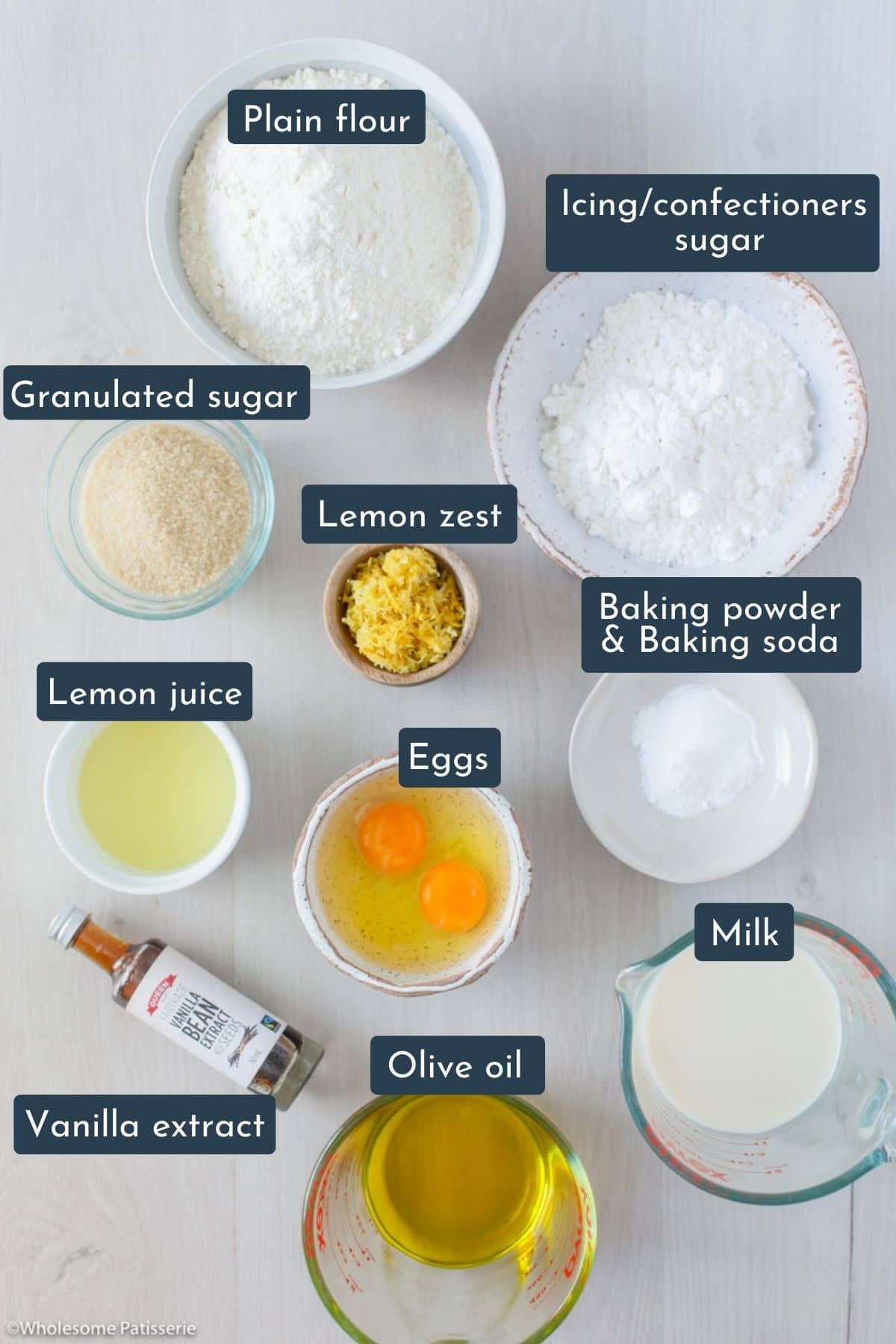 Ingredients needed to make lemon drizzle loaf, plain flour, granulated sugar, icing sugar, lemon zest, lemon juice, eggs, milk, oil and vanilla
