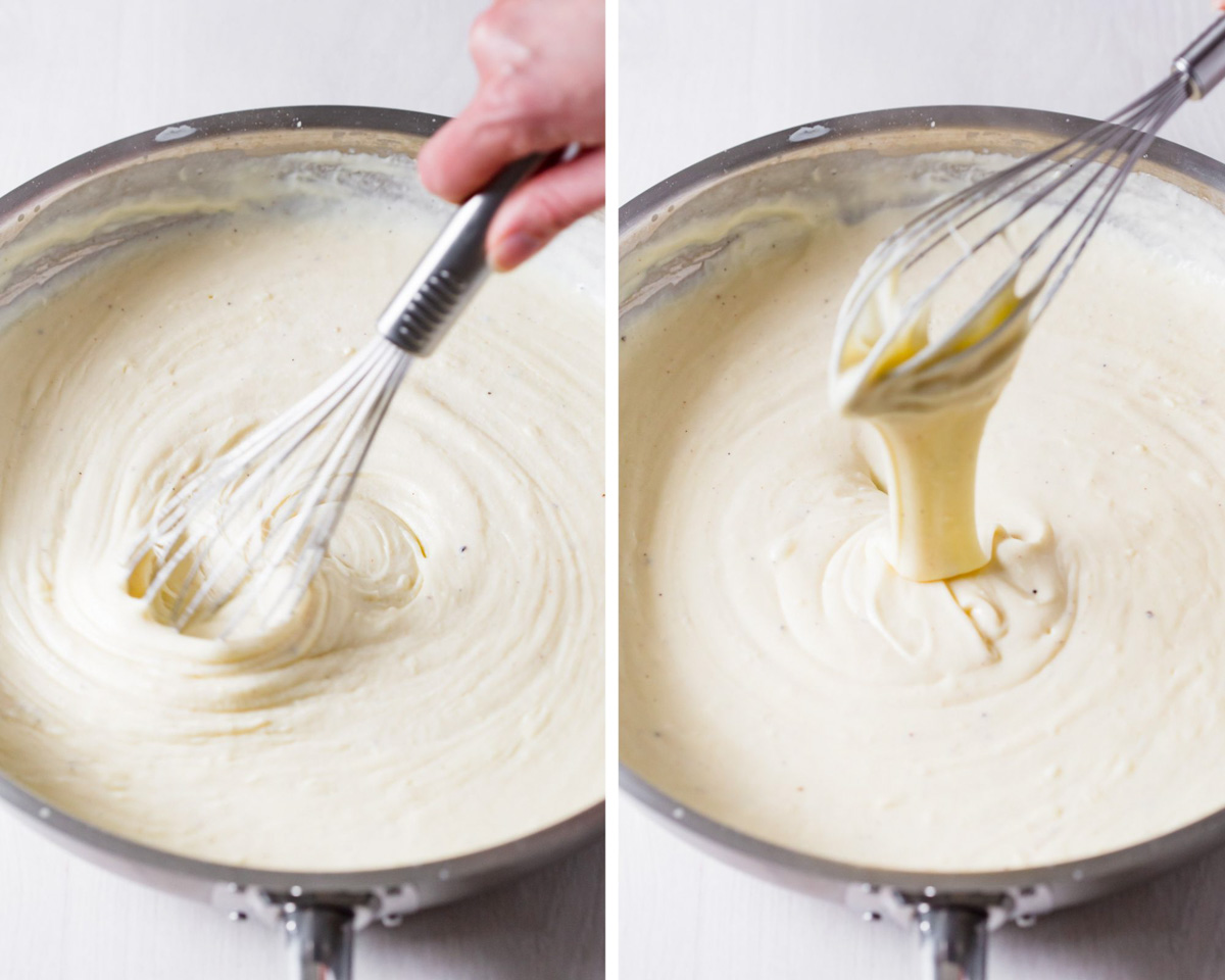 Whisking white sauce and lifting up the whisk with sauce drizzling back down in the frying pan.