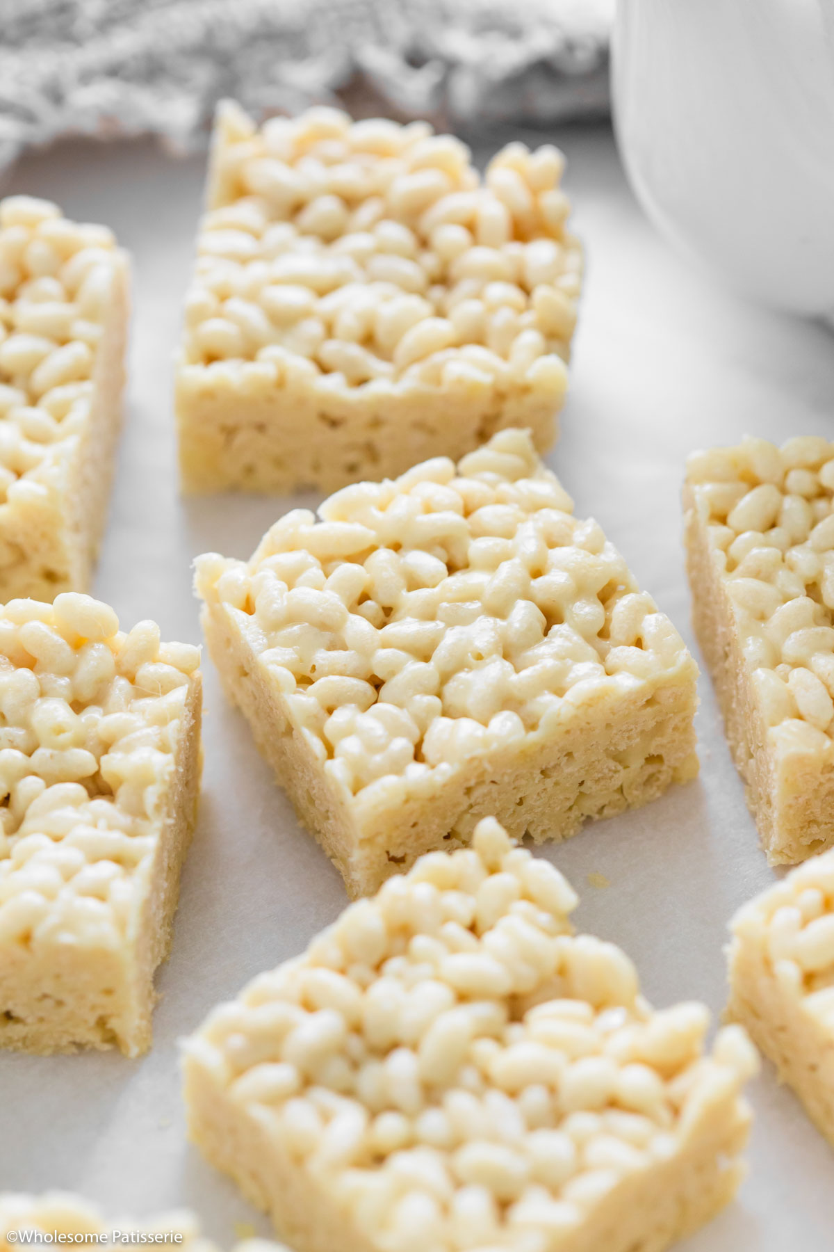 Close up of squares of rice bubble slice.