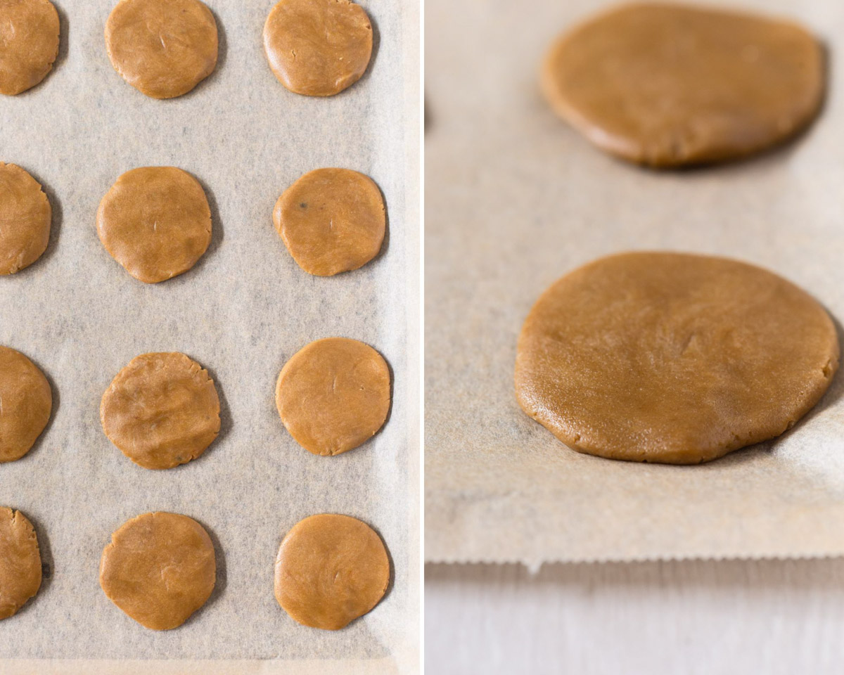 Biscuits formed and flattened into discs on lined baking sheet