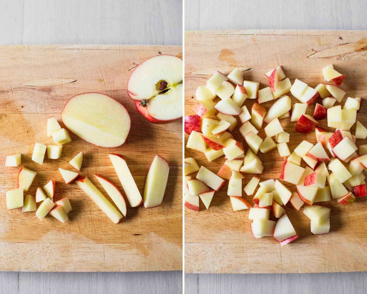 Apples chopped into small cubes on wooden chopping board