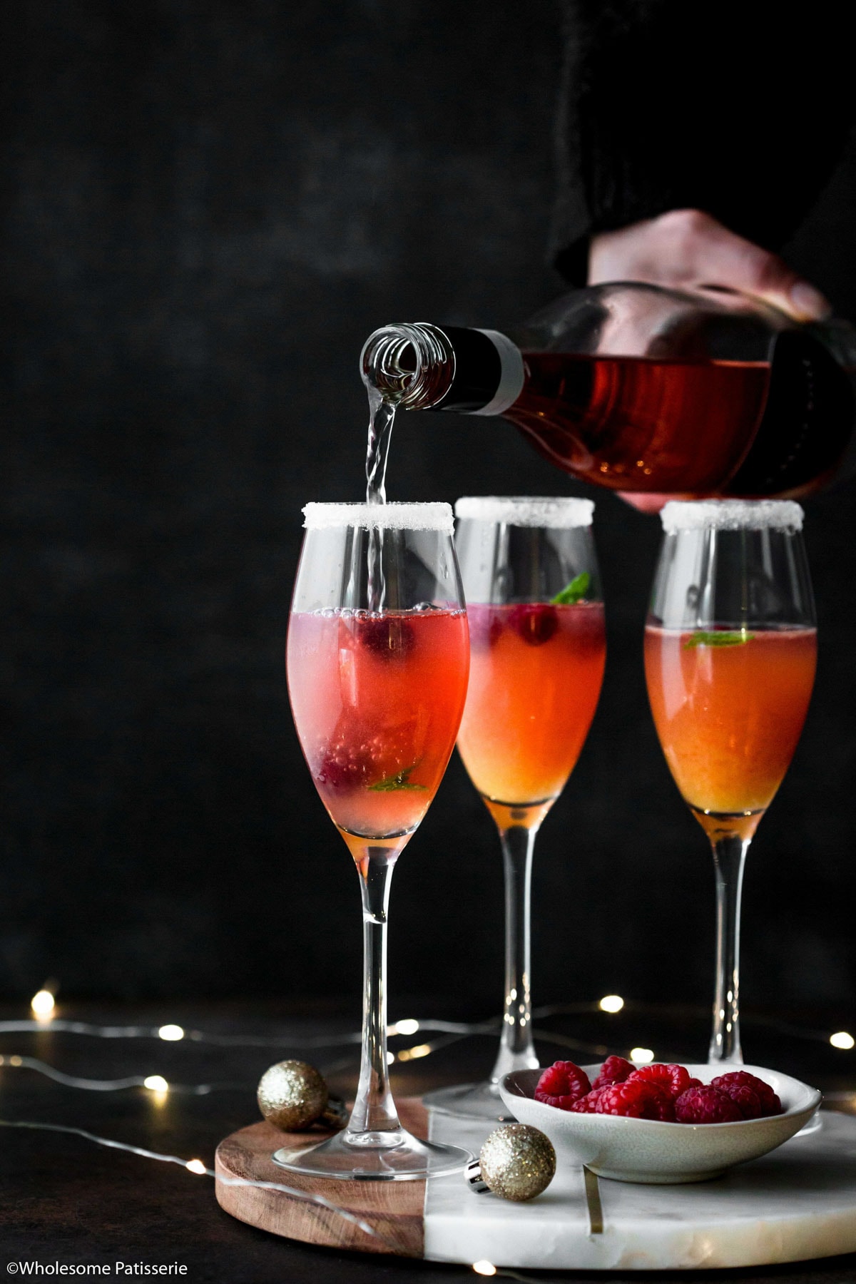 Orange juice and rosé in wine glasses.