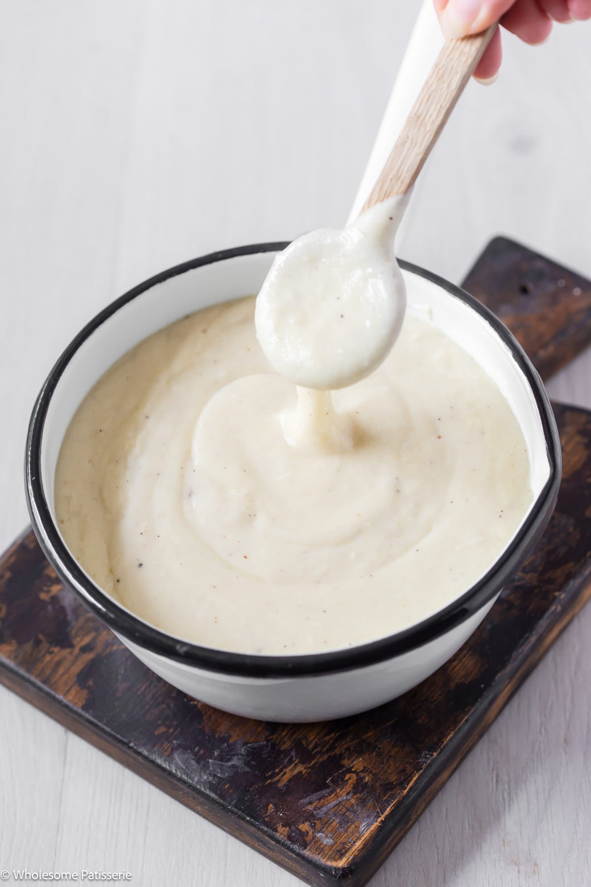 Dairy free white sauce in pot.