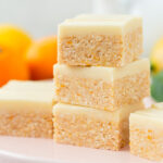 Gluten free citrus slice squares in a stack.
