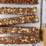 Orange pistachio hedgehog slice cut into long bars.