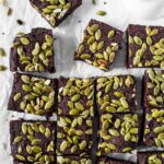 Pumpkin seed chocolate brownies sliced into squares.