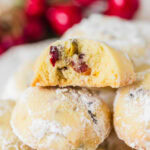 Christmas meltaway cookies stacked together.