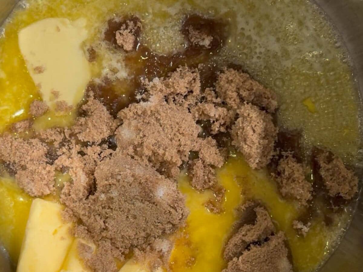 Melting butter and brown sugar in saucepan for base.