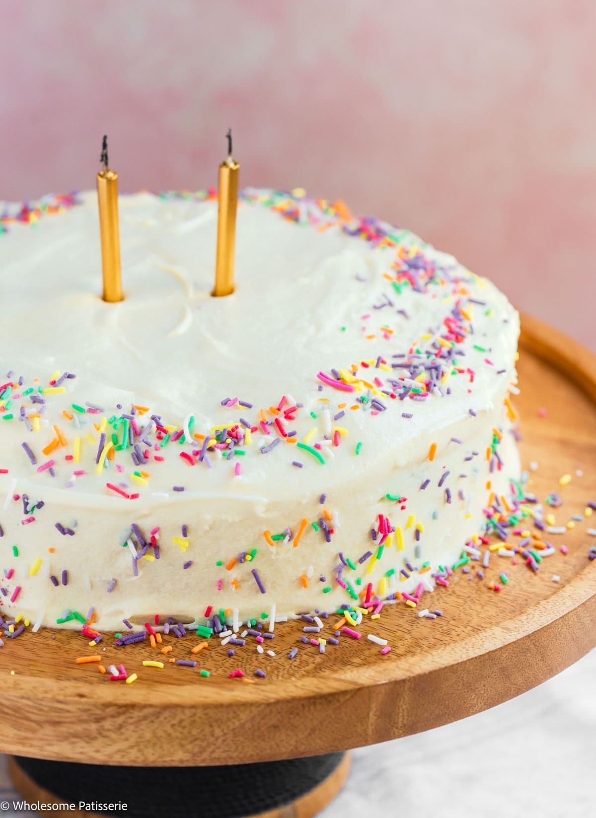 Birthday cake with frosting and sprinkles.