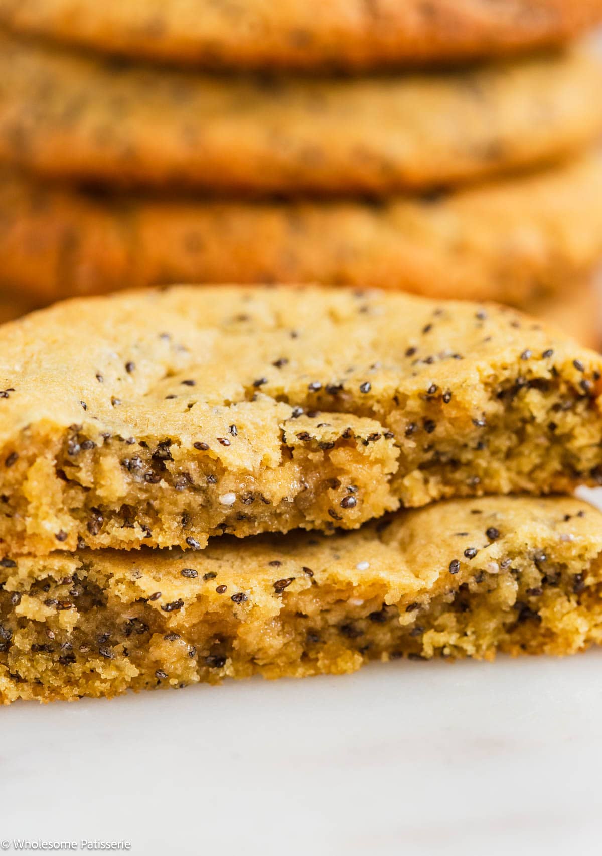 Chia seed cookies in half to show inside texture.