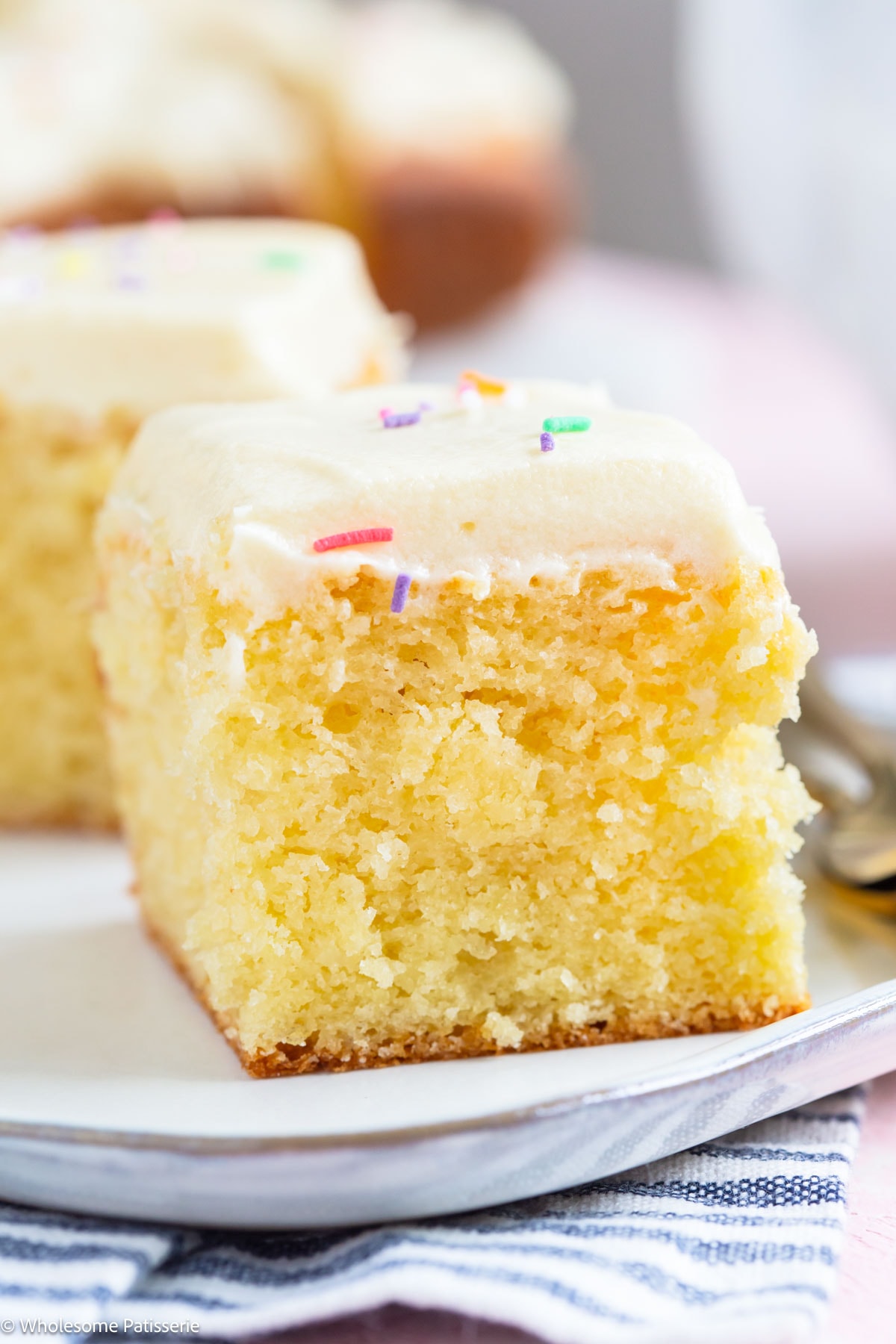 Slice of vanilla cake without cake flour on plate