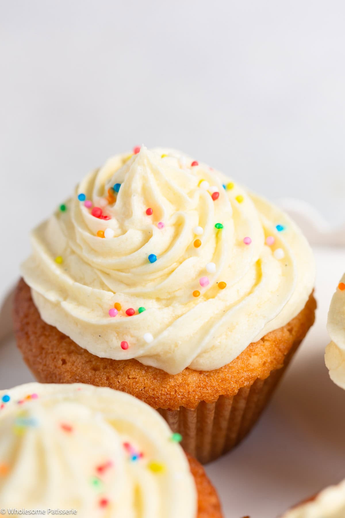 Vanilla cupcake without milk with frosting.